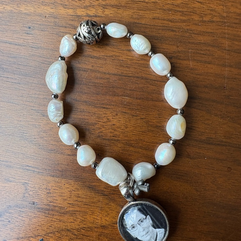 Elegant White Pearl Bracelet with Silver Accents and RBG photo charm